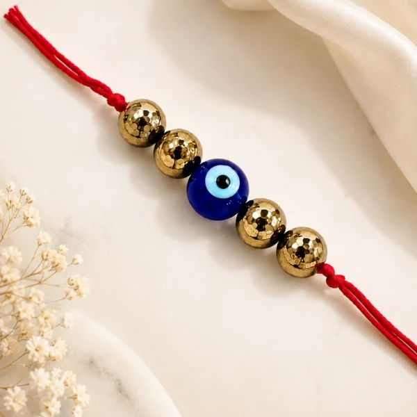 pyrite-with-evil-eye-rakhi-01 pyrite-with-evil-eye-rakhi-01